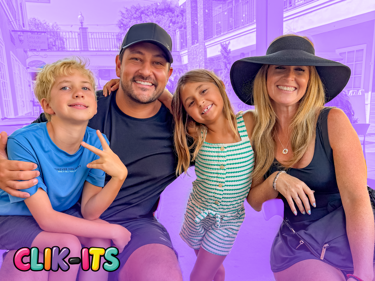 The family behind Clik-Its posing together with colorful Clik-Its fidget toys from their family-run business.